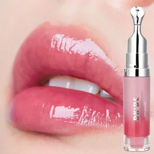 Macro detail view showing DKDE lip essence bottle and glossy pink finish on model lips