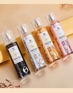 Vue détaillée de la collection de sprays parfumés Tao Beauty en quatre flacons élégants