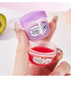 Detalle de las mascarillas labiales hidratantes de uva y fresa Meidian en mini tarros
