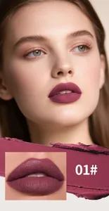 Professional close-up of matte plum lip glaze shade 01 on model with texture swatch