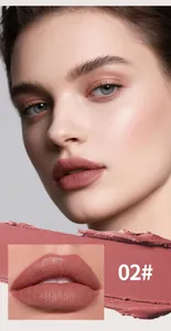 Detail view of matte chocolate lip glaze texture and shade 02 applied on model's lips