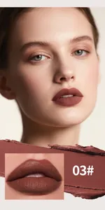 Close-up detail of matte chocolate lip glaze shade 03 showing professional makeup finish.