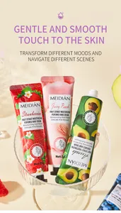 Detailed view of MEIDIÁN fruit-scented hand cream tubes arranged in a glass bowl
