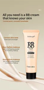 Close-up of Bosuya BB Cream tube against a flowing cream texture background for detail