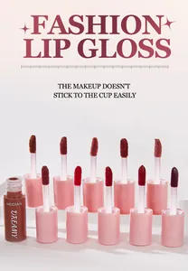 Detailed view of ten non-stick lip gloss wands in various red and pink shades
