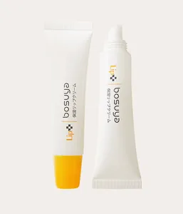 Nahaufnahme von Bosuya feuchtigkeitsspendenden Lippenbalsamtuben mit Applikator-Details