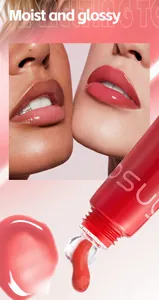 Close-up detail of moist and glossy red lip gloss showing plump texture and vibrant color finish