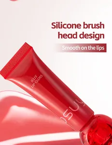 Close-up of red jelly lip gloss featuring a silicone brush head for smooth lip application