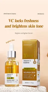 Detail van 10% Vitamine C essencefles en gouden verpakking voor huidverheldering