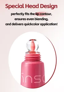 Detailed close-up showing the unique applicator head of this hydrating pink lip gloss