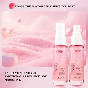 Close-up of two Bosuya fragrance mist bottles on a pink dreamy fluffy heart background.
