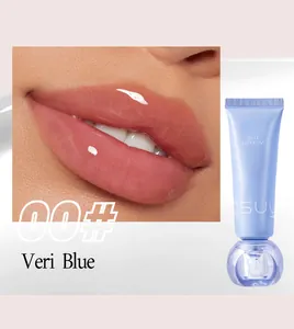 Close-up of glossy pink lips and a blue jelly lip gloss tube in shade 00# Veri Blue