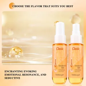 Detailed view of two Bosuya alcohol-free fragrance mist bottles in warm bubbly setting.