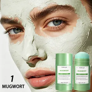 Close-up of Mugwort pore clay stick mask being applied to face for deep cleaning