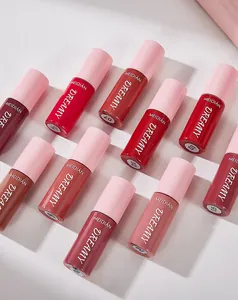 Detailed macro view of multiple MEIDIÁN Dreamy lip glaze bottles in various vibrant shades