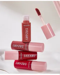 Close-up of MEIDIAN long-lasting non-stick lip glaze with applicator and color variety