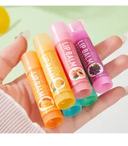 Detailed view of four flavored moisturizing lip balms with Vitamin E and honey.
