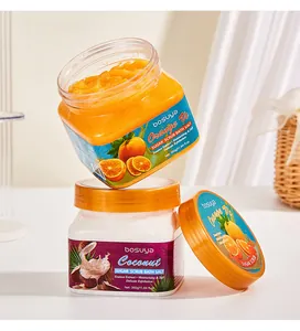 Detalle de los frascos de exfoliante BOSUYA con textura naranja vibrante