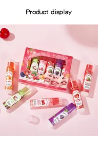 Detailed view of Bosuya 6-piece fruit flavored lip balm set in a pink background