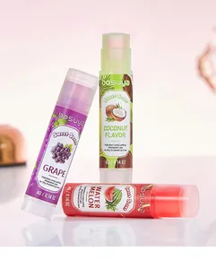 Close-up of three fruit-flavored lip balms in grape, coconut and watermelon scents.