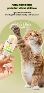 Pet paw balm detail showing smooth light yellow cream texture for cats and dogs
