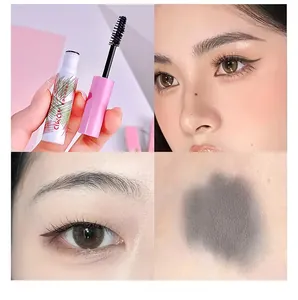 Detail showing ADMD eyebrow tint mascara application and waterproof texture on skin