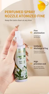 Close-up of ADMD gardenia scented fragrance spray bottle with fine atomization nozzle