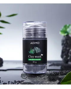 Nahaufnahme von ADMD Aktivkohle-Tonmasken-Stick 40g auf einem Naturstein-Hintergrund