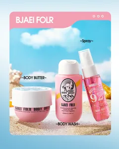Macro view of FORMBO pink cosmetic set including body wash and spray on beach sand
