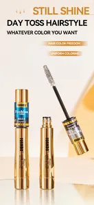 Détail du bâton de coloration FORMBO avec tubes dorés et tête de brosse