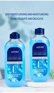 Detail view of ADMD Collagen and Hyaluronic Acid Toner bottles on white stone base.