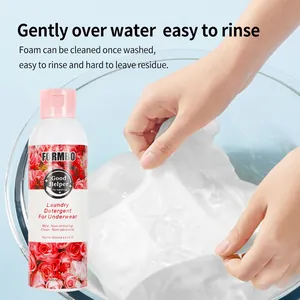 Detail view of gentle laundry detergent for underwear being used in a water basin.