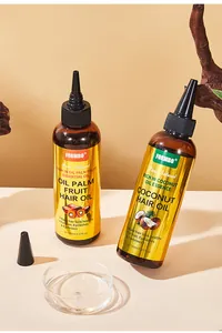Vista dettagliata dei flaconi di olio per capelli FORMBO al cocco e frutto di palma