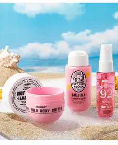 FORMBO 3-in-1 fragrance body care set with body butter wash and hair mist on beach
