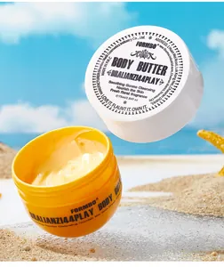 Close-up of creamy yellow body butter in a jar on a sunny beach background