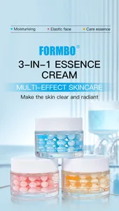 Close-up detail of FORMBO essence cream showing colorful skincare capsule textures