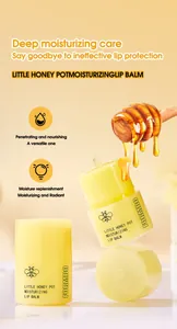 Deep moisturizing honey pot lip balm with honey dipper and rich texture detail