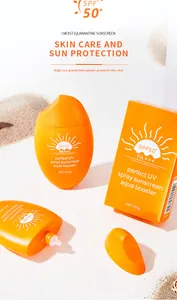 Détail montrant le flacon d'écran solaire SPF50+ orange et son emballage
