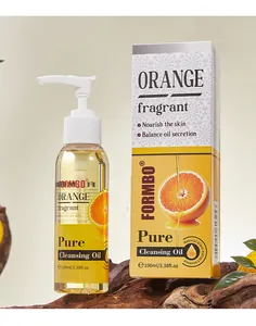 FORMBO Oranje reinigingsolie 100ml fles en doos op een natuurlijke houten basis