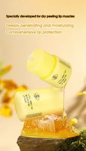 Detailed view of FORMBO little honey pot lip balm with honey dripping on honeycomb
