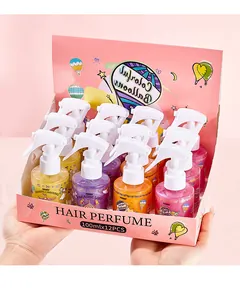 Coffret de sprays parfumés pour cheveux FORMBO dans une boîte de présentation rose décorée