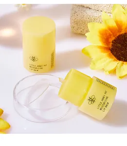 Close-up detail of FORMBO Little Honey Pot moisturizing lip balm texture and packaging