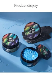 Close-up detail of FORMBO blue hair color clay texture and colorful styling jars