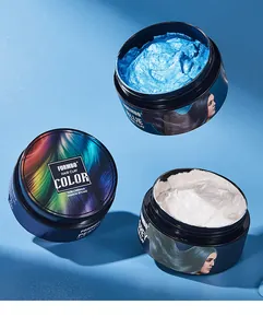 Macro detail of blue and grey FORMBO temporary hair color clay jars with visible texture