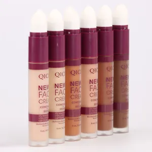Close-up detail view showing six shades of QICIY concealer sticks with sponge applicators