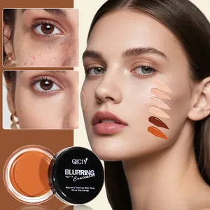 Detailed view showing QICIY concealer swatches and skin blemish coverage effect