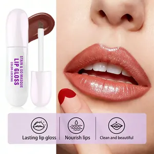 Close-up of glossy lip stain masque with nourishing effects on lips and product tube.