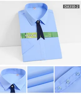 Detail view of light blue bamboo fiber professional shirt showing fabric and buttons