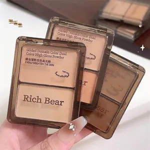 Vue détaillée de la palette de poudre illuminatrice et contour Rich Bear bicolore