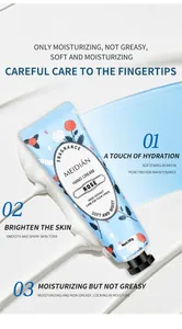 Detail of MEIDIÁN rose fragrance hand cream showing rich cream texture and tube design.